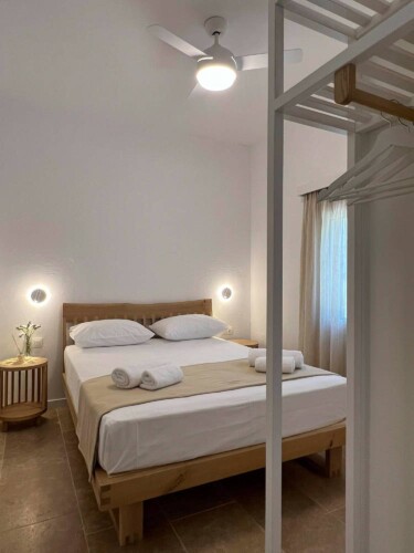 Cozy holiday home with modern kitchen, comfortable living room, bright bedroom, and private garden, ideal for a relaxing stay in Skiathos