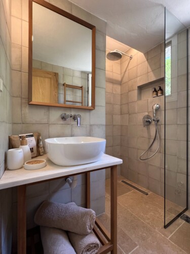 Cozy holiday home with modern kitchen, comfortable living room, bright bedroom, and private garden, ideal for a relaxing stay in Skiathos