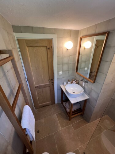 Cozy holiday home with modern kitchen, comfortable living room, bright bedroom, and private garden, ideal for a relaxing stay in Skiathos