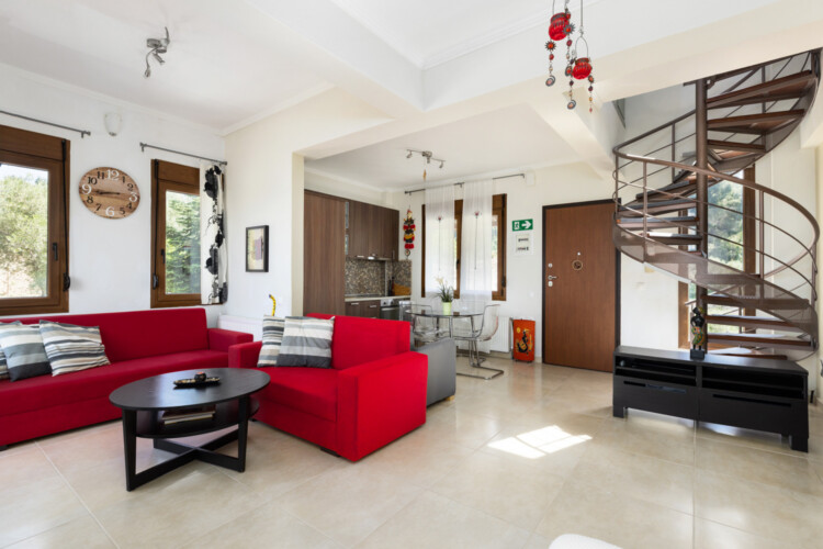 Frida & Rosa villas in Kripogi offering modern two-level holiday homes with private gardens and comfortable living spaces for a relaxing getaway in Halkidiki.