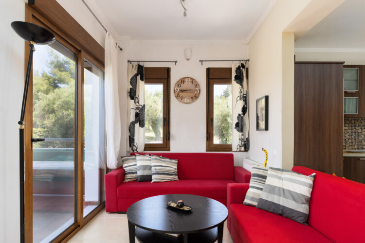 Frida & Rosa villas in Kripogi offering modern two-level holiday homes with private gardens and comfortable living spaces for a relaxing getaway in Halkidiki.