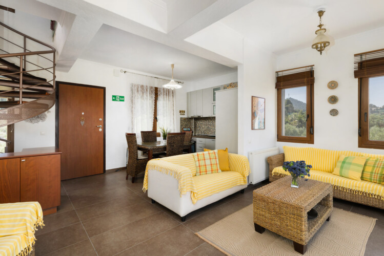 Frida & Rosa villas in Kripogi offering modern two-level holiday homes with private gardens and comfortable living spaces for a relaxing getaway in Halkidiki.