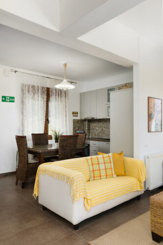 Frida & Rosa villas in Kripogi offering modern two-level holiday homes with private gardens and comfortable living spaces for a relaxing getaway in Halkidiki.