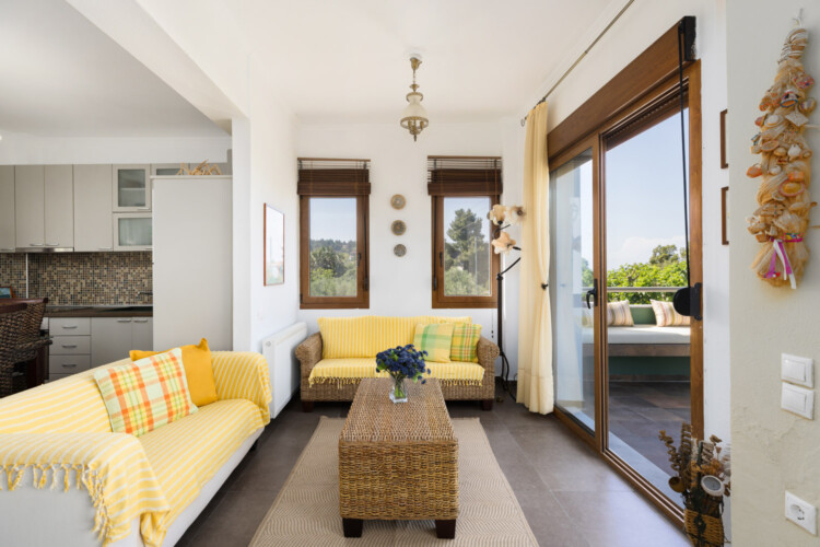 Frida & Rosa villas in Kripogi offering modern two-level holiday homes with private gardens and comfortable living spaces for a relaxing getaway in Halkidiki.