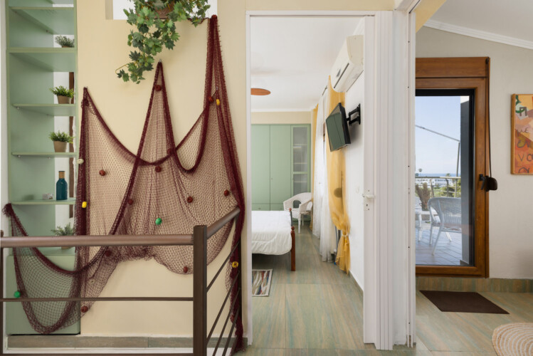 Frida & Rosa villas in Kripogi offering modern two-level holiday homes with private gardens and comfortable living spaces for a relaxing getaway in Halkidiki.