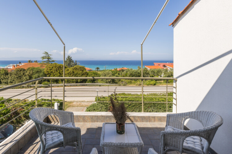 Frida & Rosa villas in Kripogi offering modern two-level holiday homes with private gardens and comfortable living spaces for a relaxing getaway in Halkidiki.