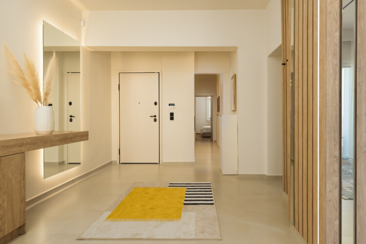 Ivory premium two-bedroom apartment on Leoforos Nikis in Thessaloniki with elegant design, sea views, and modern amenities for a luxurious stay.