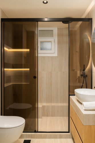 Ivory premium two-bedroom apartment on Leoforos Nikis in Thessaloniki with elegant design, sea views, and modern amenities for a luxurious stay.