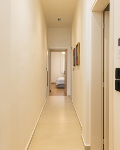 Ivory premium two-bedroom apartment on Leoforos Nikis in Thessaloniki with elegant design, sea views, and modern amenities for a luxurious stay.