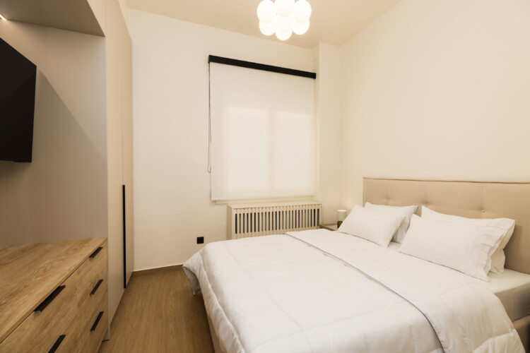 Ivory premium two-bedroom apartment on Leoforos Nikis in Thessaloniki with elegant design, sea views, and modern amenities for a luxurious stay.