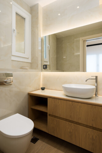 Ivory premium two-bedroom apartment on Leoforos Nikis in Thessaloniki with elegant design, sea views, and modern amenities for a luxurious stay.