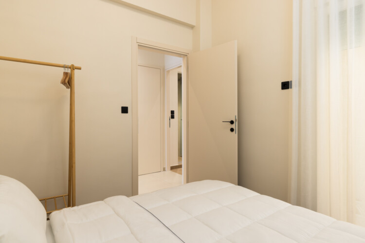 Ivory premium two-bedroom apartment on Leoforos Nikis in Thessaloniki with elegant design, sea views, and modern amenities for a luxurious stay.