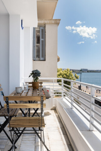 Ivory premium two-bedroom apartment on Leoforos Nikis in Thessaloniki with elegant design, sea views, and modern amenities for a luxurious stay.