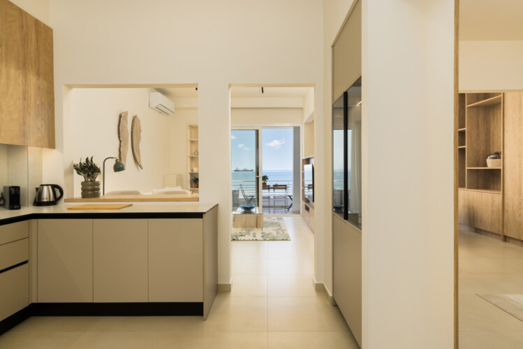 Ivory premium two-bedroom apartment on Leoforos Nikis in Thessaloniki with elegant design, sea views, and modern amenities for a luxurious stay.