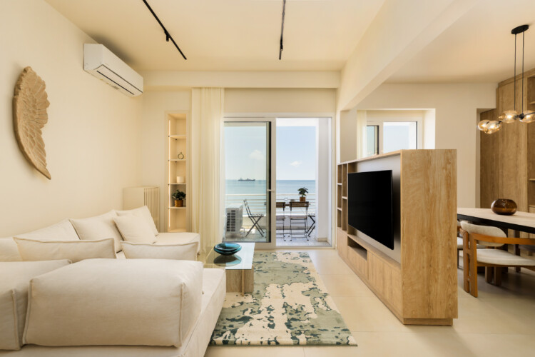 Ivory premium two-bedroom apartment on Leoforos Nikis in Thessaloniki with elegant design, sea views, and modern amenities for a luxurious stay.