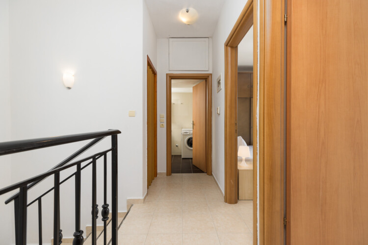 Villa Anthea in Fourka, a spacious holiday villa with private garden, outdoor dining area, and family-friendly amenities for a relaxing stay in Halkidiki.