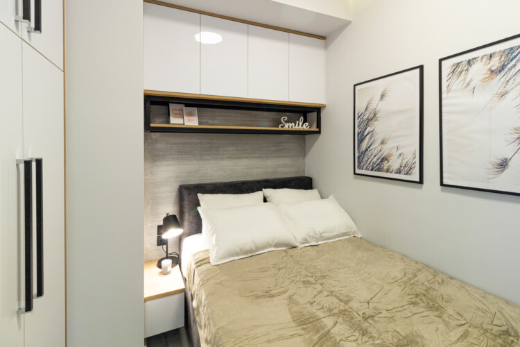 Modern two-bedroom apartment with stylish living room, fully equipped kitchen, balcony, and contemporary design for a comfortable stay in Thessaloniki.