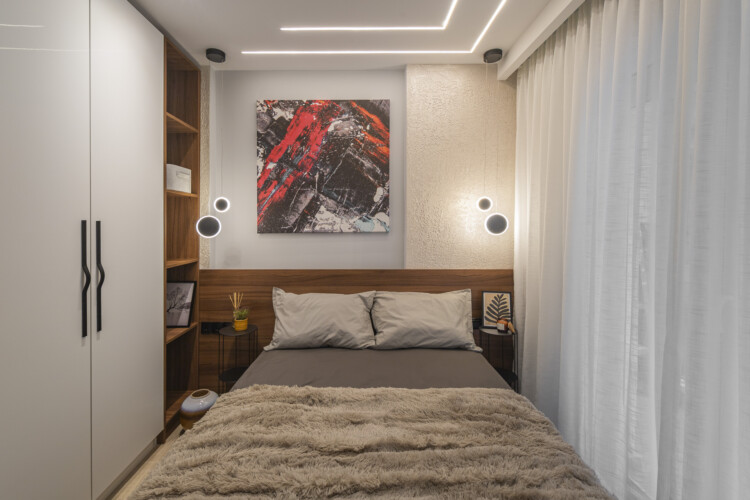Modern two-bedroom apartment with stylish living room, fully equipped kitchen, balcony, and contemporary design for a comfortable stay in Thessaloniki.