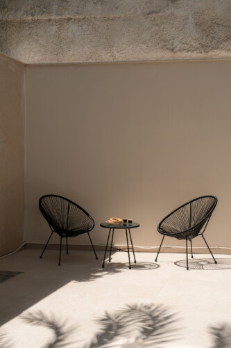 Dry Martini two-bedroom apartment in the city center with premium amenities, two bathrooms, stylish living room, and private balcony for a comfortable stay in Thessaloniki.