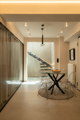 Dry Martini two-bedroom apartment in the city center with premium amenities, two bathrooms, stylish living room, and private balcony for a comfortable stay in Thessaloniki.