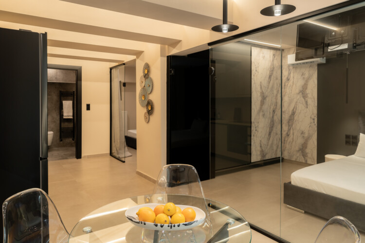 Dry Martini two-bedroom apartment in the city center with premium amenities, two bathrooms, stylish living room, and private balcony for a comfortable stay in Thessaloniki.
