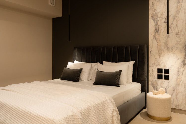 Dry Martini two-bedroom apartment in the city center with premium amenities, two bathrooms, stylish living room, and private balcony for a comfortable stay in Thessaloniki.