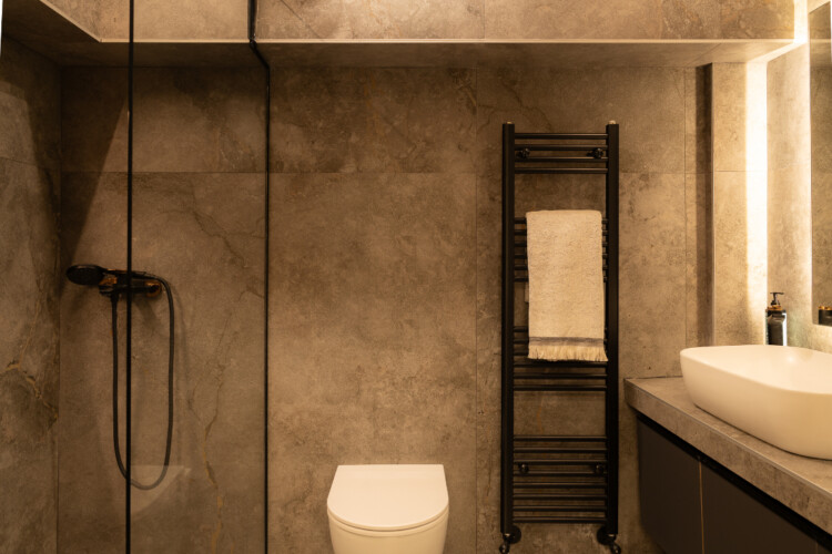 Dry Martini two-bedroom apartment in the city center with premium amenities, two bathrooms, stylish living room, and private balcony for a comfortable stay in Thessaloniki.