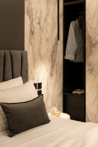 Dry Martini two-bedroom apartment in the city center with premium amenities, two bathrooms, stylish living room, and private balcony for a comfortable stay in Thessaloniki.