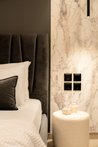 Dry Martini two-bedroom apartment in the city center with premium amenities, two bathrooms, stylish living room, and private balcony for a comfortable stay in Thessaloniki.