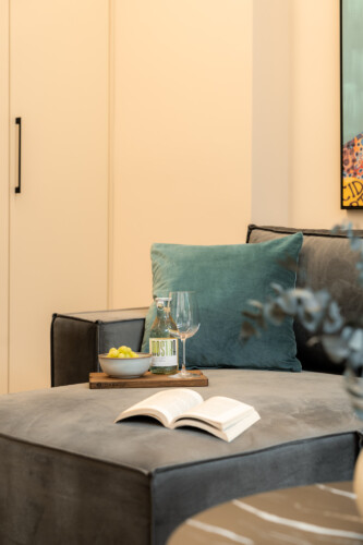 Dry Martini two-bedroom apartment in the city center with premium amenities, two bathrooms, stylish living room, and private balcony for a comfortable stay in Thessaloniki.
