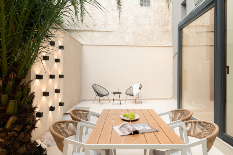 Dry Martini two-bedroom apartment in the city center with premium amenities, two bathrooms, stylish living room, and private balcony for a comfortable stay in Thessaloniki.