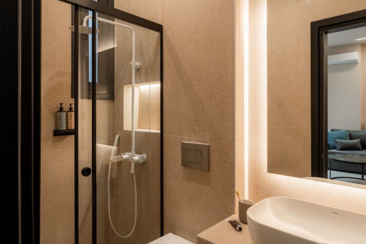 Dry Martini two-bedroom apartment in the city center with premium amenities, two bathrooms, stylish living room, and private balcony for a comfortable stay in Thessaloniki.