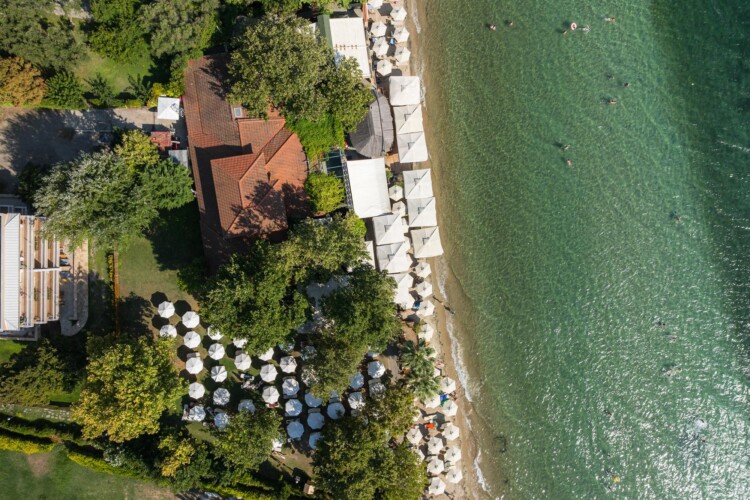 "KYMA STAY beachfront apartments in Palioura Epanomi, offering one-bedroom and two-bedroom options next to Kyma Beach Bar for a relaxing seaside getaway in Greece.