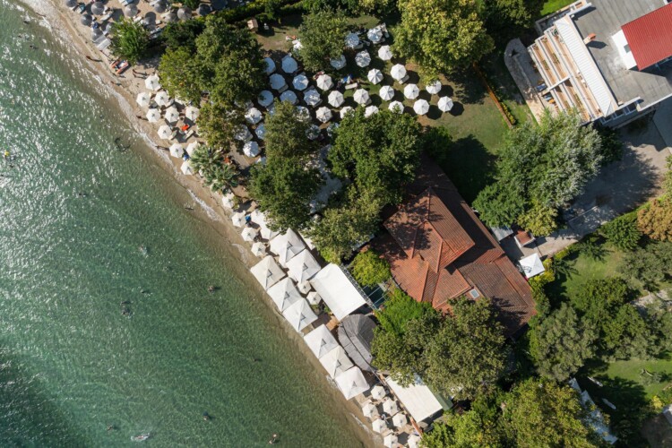 "KYMA STAY beachfront apartments in Palioura Epanomi, offering one-bedroom and two-bedroom options next to Kyma Beach Bar for a relaxing seaside getaway in Greece.