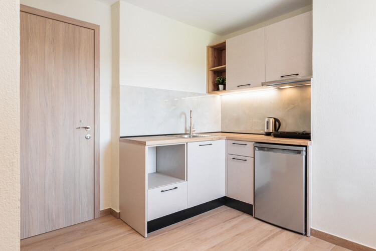 "KYMA STAY beachfront apartments in Palioura Epanomi, offering one-bedroom and two-bedroom options next to Kyma Beach Bar for a relaxing seaside getaway in Greece.