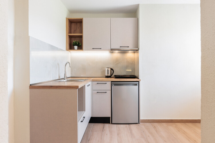 "KYMA STAY beachfront apartments in Palioura Epanomi, offering one-bedroom and two-bedroom options next to Kyma Beach Bar for a relaxing seaside getaway in Greece.