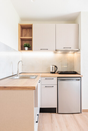 "KYMA STAY beachfront apartments in Palioura Epanomi, offering one-bedroom and two-bedroom options next to Kyma Beach Bar for a relaxing seaside getaway in Greece.