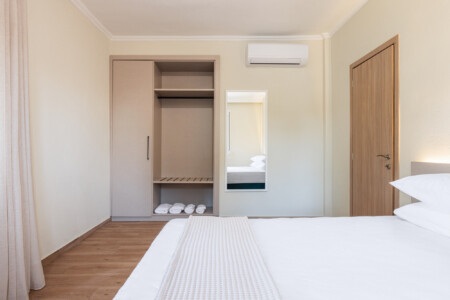 "KYMA STAY beachfront apartments in Palioura Epanomi, offering one-bedroom and two-bedroom options next to Kyma Beach Bar for a relaxing seaside getaway in Greece.