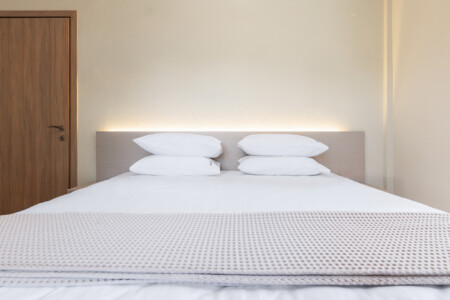 "KYMA STAY beachfront apartments in Palioura Epanomi, offering one-bedroom and two-bedroom options next to Kyma Beach Bar for a relaxing seaside getaway in Greece.