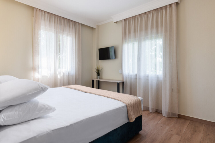 "KYMA STAY beachfront apartments in Palioura Epanomi, offering one-bedroom and two-bedroom options next to Kyma Beach Bar for a relaxing seaside getaway in Greece.