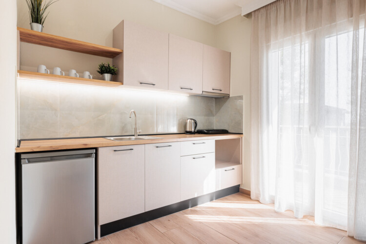 "KYMA STAY beachfront apartments in Palioura Epanomi, offering one-bedroom and two-bedroom options next to Kyma Beach Bar for a relaxing seaside getaway in Greece.