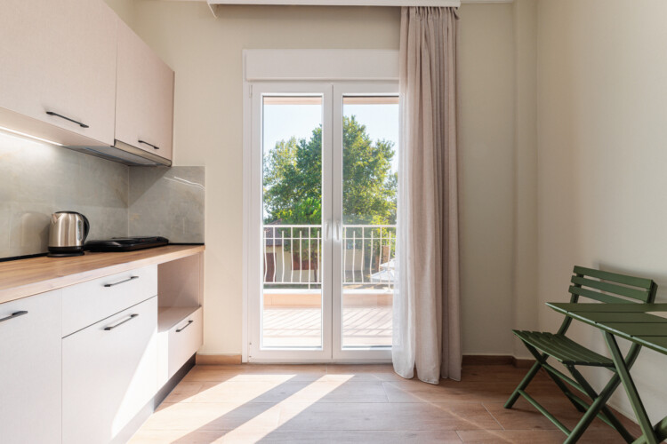 "KYMA STAY beachfront apartments in Palioura Epanomi, offering one-bedroom and two-bedroom options next to Kyma Beach Bar for a relaxing seaside getaway in Greece.