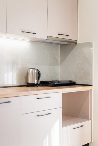 "KYMA STAY beachfront apartments in Palioura Epanomi, offering one-bedroom and two-bedroom options next to Kyma Beach Bar for a relaxing seaside getaway in Greece.