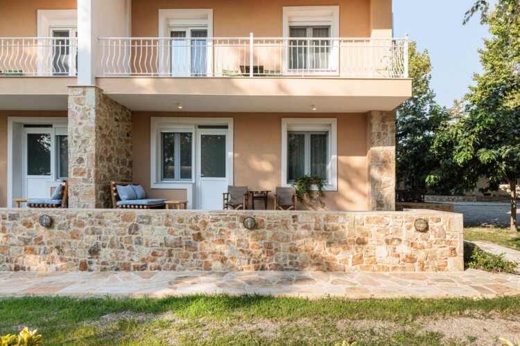 "KYMA STAY beachfront apartments in Palioura Epanomi, offering one-bedroom and two-bedroom options next to Kyma Beach Bar for a relaxing seaside getaway in Greece.