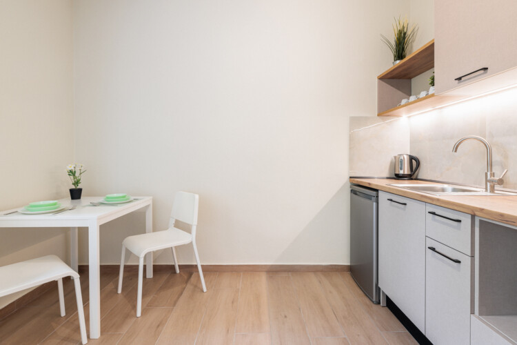 "KYMA STAY beachfront apartments in Palioura Epanomi, offering one-bedroom and two-bedroom options next to Kyma Beach Bar for a relaxing seaside getaway in Greece.