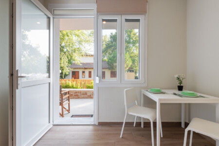 "KYMA STAY beachfront apartments in Palioura Epanomi, offering one-bedroom and two-bedroom options next to Kyma Beach Bar for a relaxing seaside getaway in Greece.