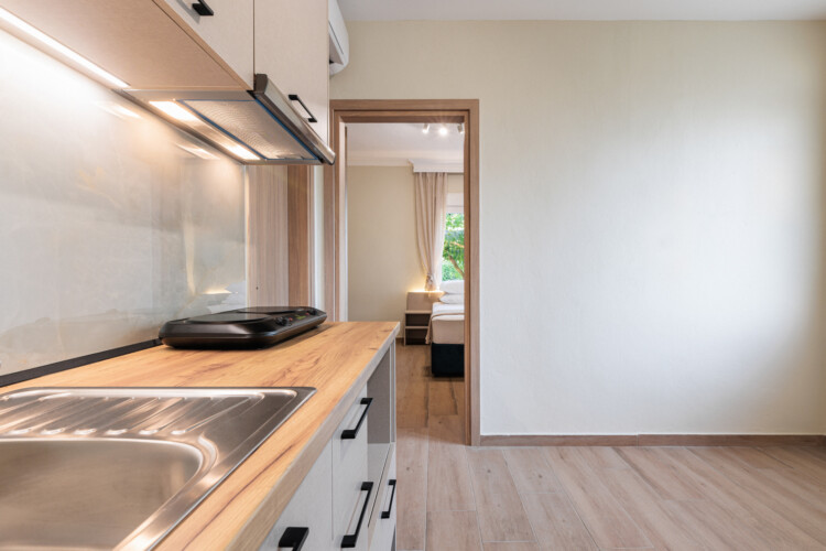 "KYMA STAY beachfront apartments in Palioura Epanomi, offering one-bedroom and two-bedroom options next to Kyma Beach Bar for a relaxing seaside getaway in Greece.