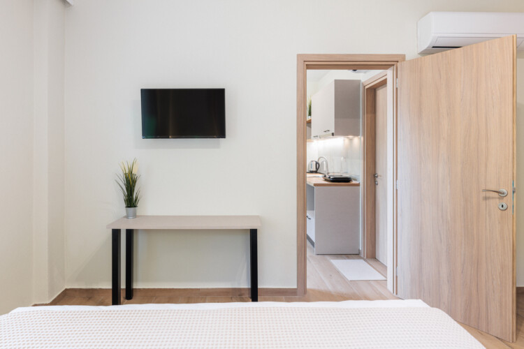 "KYMA STAY beachfront apartments in Palioura Epanomi, offering one-bedroom and two-bedroom options next to Kyma Beach Bar for a relaxing seaside getaway in Greece.