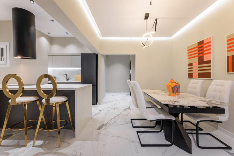 Dry Martini two-bedroom apartment in the city center with premium amenities, two bathrooms, stylish living room, and private balcony for a comfortable stay in Thessaloniki.