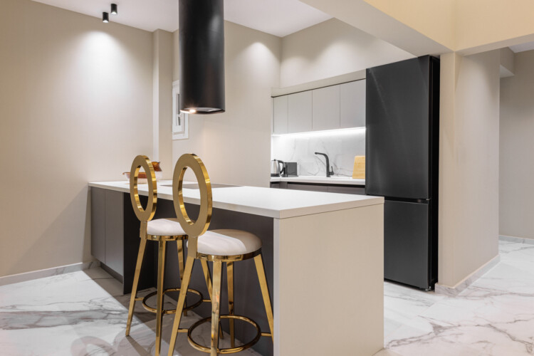 Dry Martini two-bedroom apartment in the city center with premium amenities, two bathrooms, stylish living room, and private balcony for a comfortable stay in Thessaloniki.